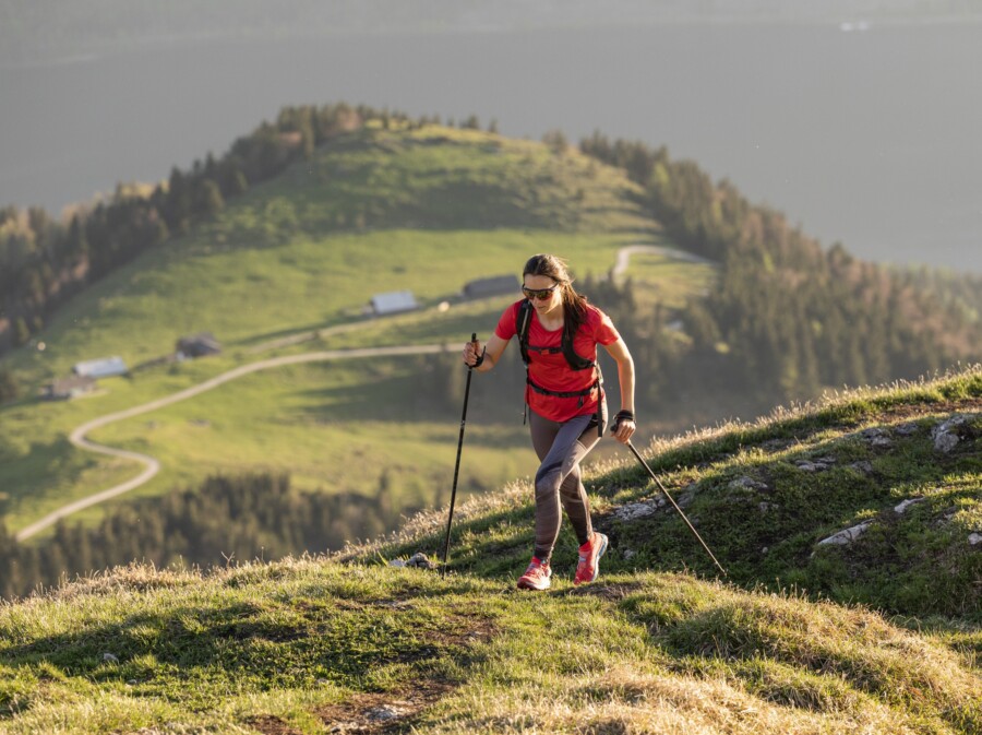A woman speed hiking.