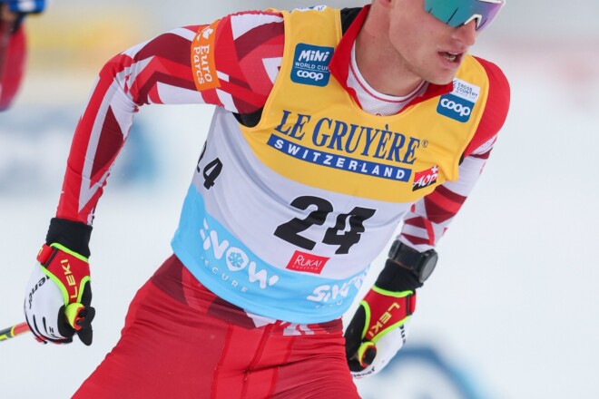 Nordic skier in Löffler racing suit.