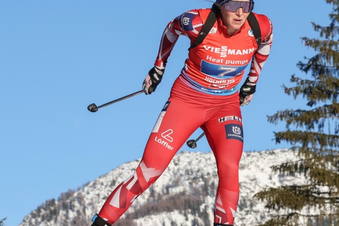 Nordic skier in Löffler racing suit.