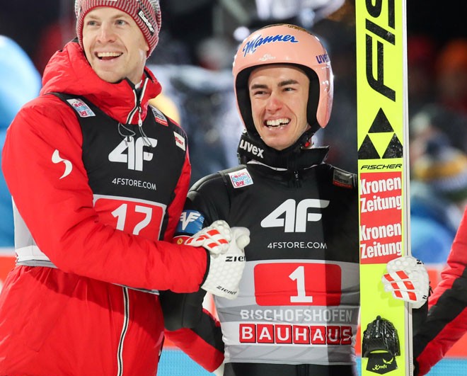 Stefan Kraft and Michael Hayböck celebrating.